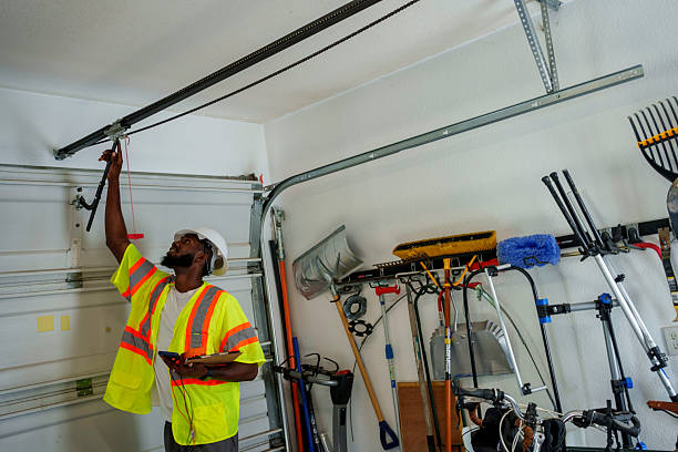 Professional Garage Door Installation technician working in Oriole Beach, FL